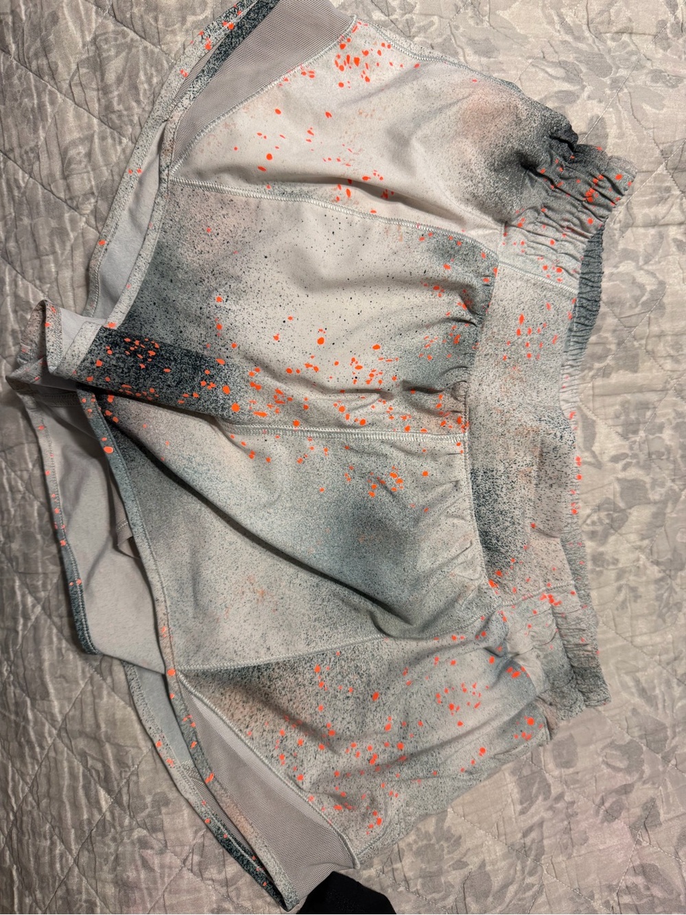 Light Gray Lululemon Shorts with Neon Orange Splatter